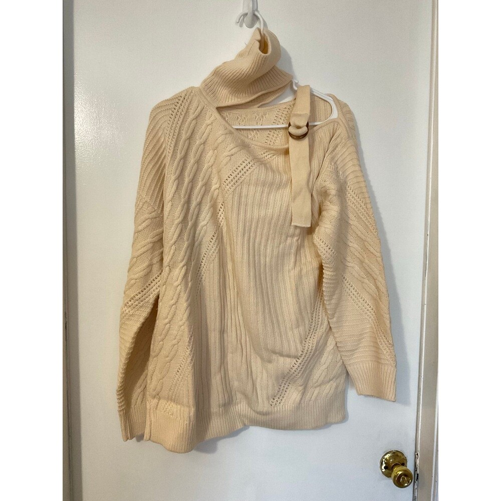 Cream cable knit sweater with turtleneck and long sleeves. Size: XL